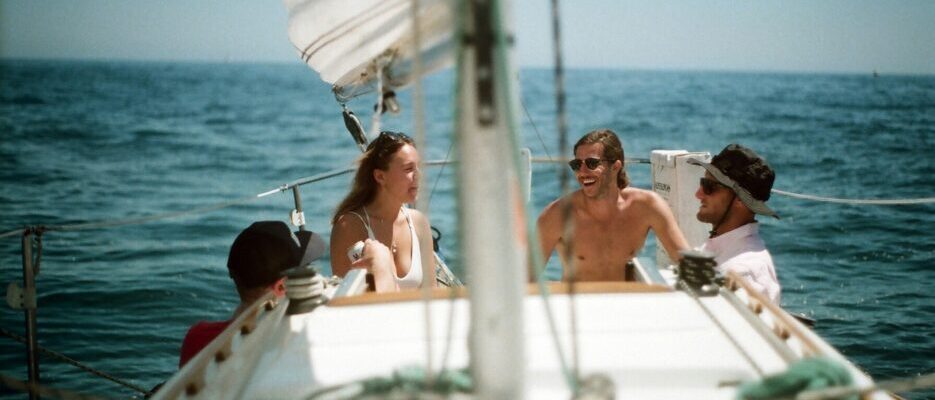 people on a sailboat.